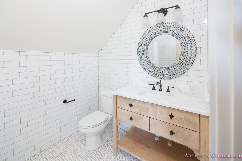 whitewashed-vanity-bathroom-cabinet-white-subway-tile-dark-grout-hexagon-white-tile-floors
