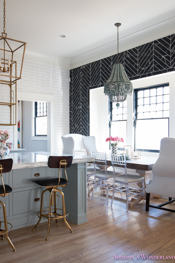breakfast-room-black-chevron-wall-tile-white-wingback-dining-chairs-wood-table-clear-lucite-chairs-powder-blue-cabinets-16-of-28