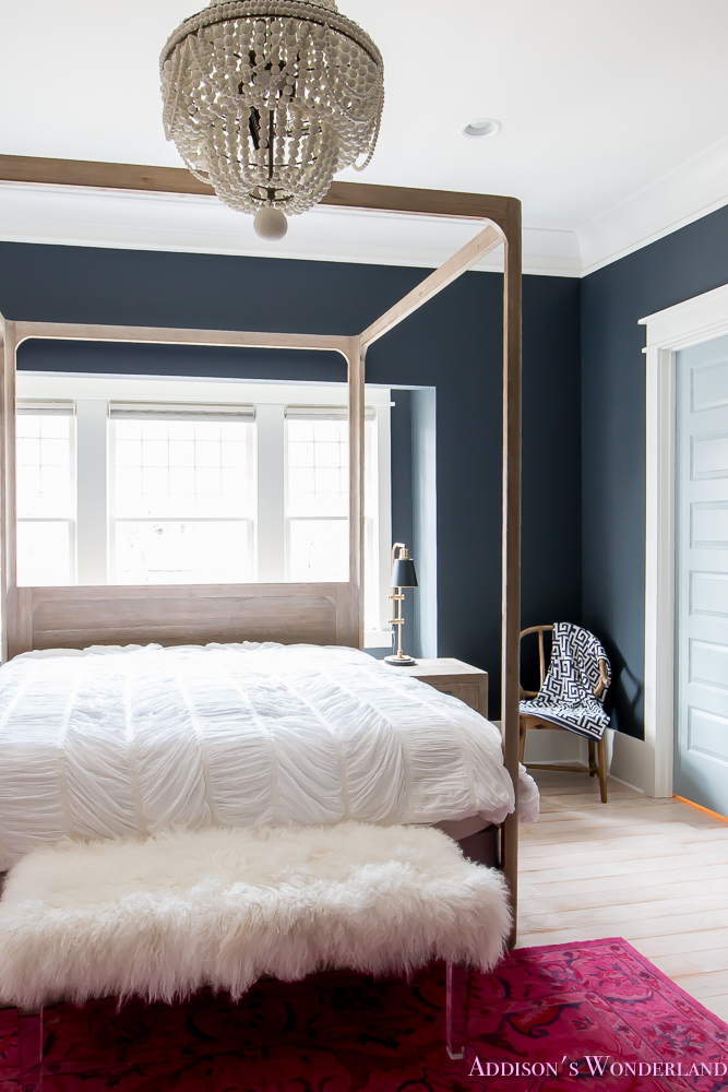 master-bedroom-black-walls-white-wood-bead-chandelier-whitewashed-hardwood-flooring-four-poster-bed-restpration-hardware-inkwell-rug-15-of-19