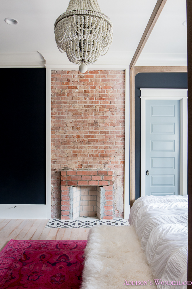 master-bedroom-black-walls-white-wood-bead-chandelier-whitewashed-hardwood-flooring-four-poster-bed-restpration-hardware-inkwell-rug-18-of-19